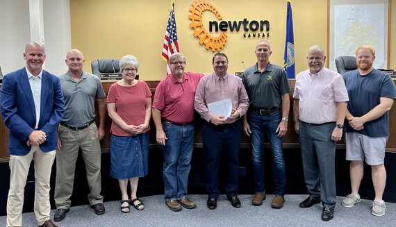 USGA and golf course staff pose with City Commissioners