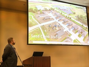 Zach McHatton presents video at Newton Area Chamber of Commerce breakfast