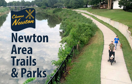 Trail Map/Park Directory cover with people walking on the Sand Creek Trail