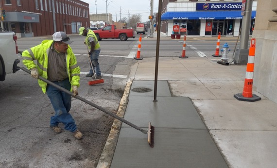 Street staff doing inlet work downtown