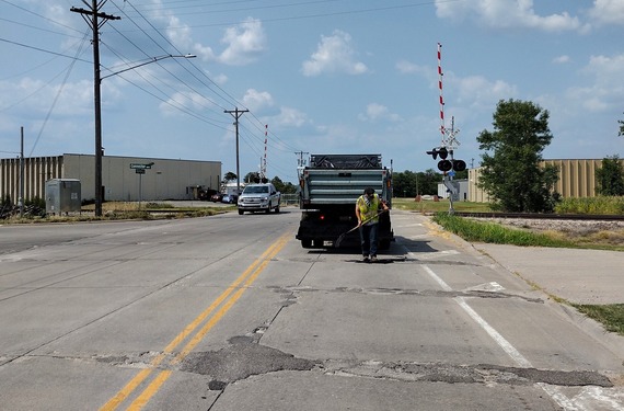 City crew patching on South Spencer Road
