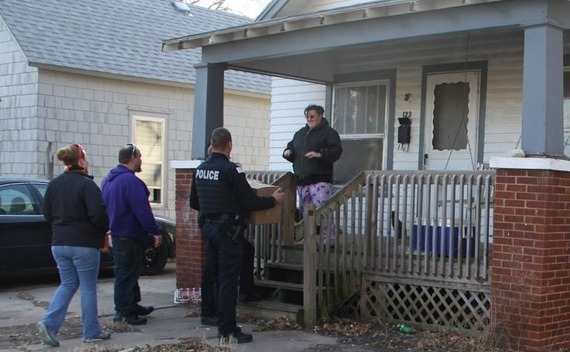 Police deliver Holiday Helpers food box
