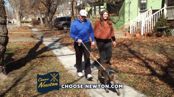 Couple Walking their Dog