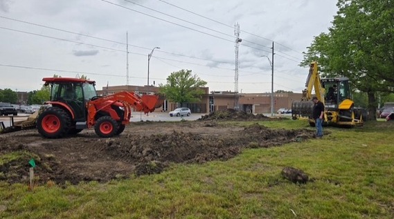 Parks staff prep for swing set installation