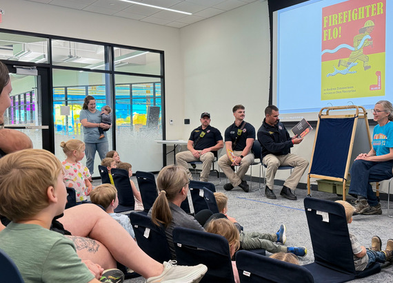 Firefighters reading at preschool story time