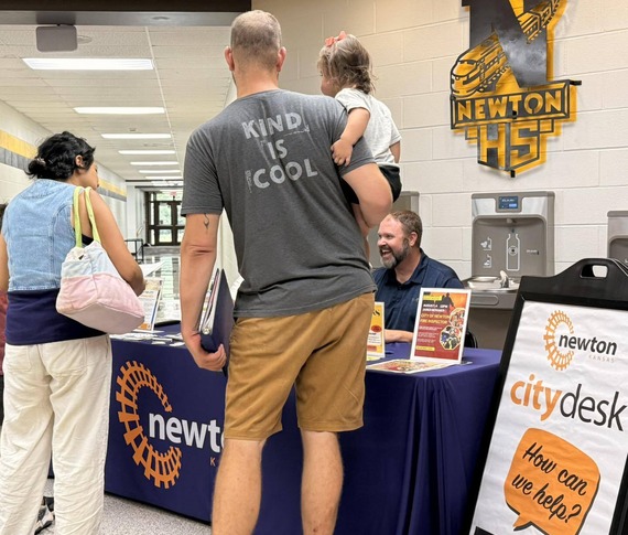 People chatting at City Desk event