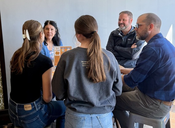 City staff and commissioner visit with citizens at Norm's