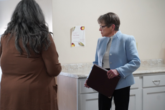 Governor Kelly tours the YWCA in Topeka earlier this year