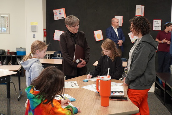 Governor Kelly during a visit to a school