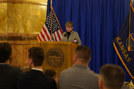 Governor Kelly speaks to a crowd