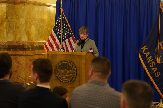 Governor Kelly speaks to a crowd