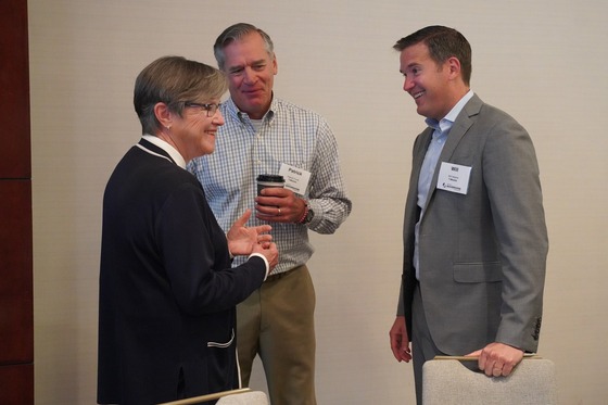 Governor Kelly speaks with leaders at a broadband conference earlier this year