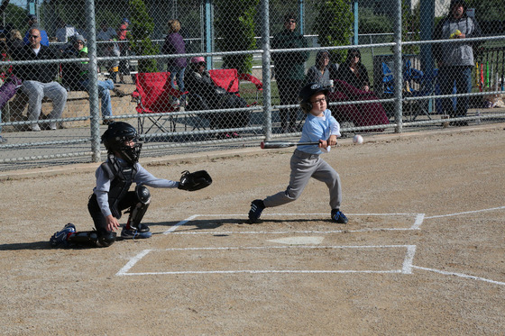 Youth baseball catcher and hitter