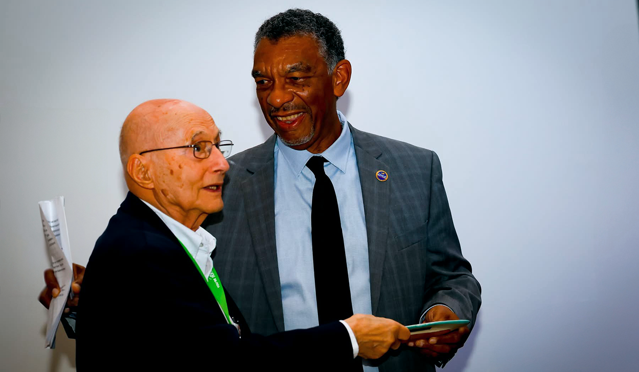 John Rosenberg presenting to Aaron Thompson