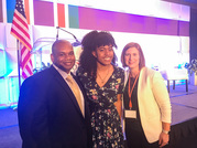Bryan Station High School junior LaMargaret Johnson poses with Commissioner Wayne Lewis and her teacher, Catherine Vanatter.