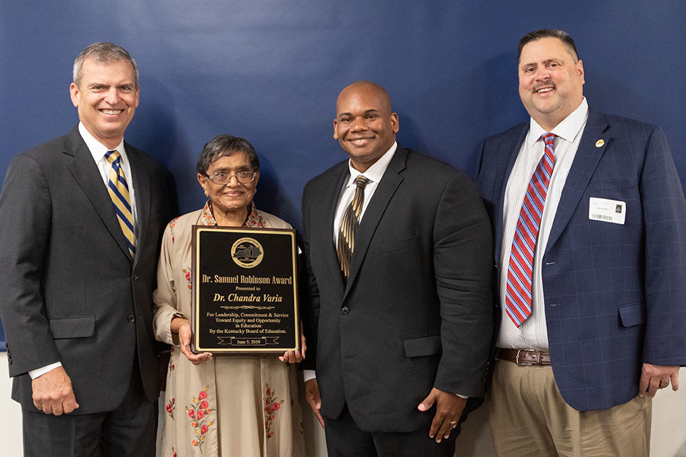 The Kentucky Board of Education presented the Dr. Samuel Robinson Award to Dr. Chandra Varia, a retired Floyd County physician.