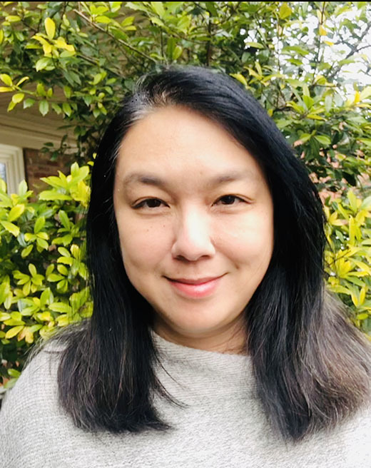 Picture of a smiling woman.