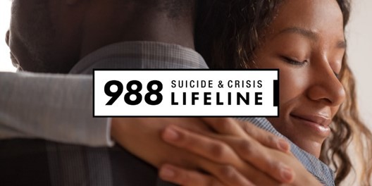 woman hugging a man with the number 988 and text suicide and crisis lifeline