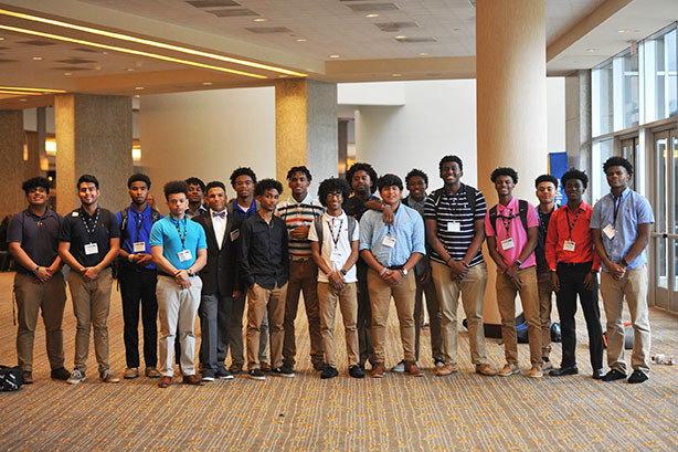 Picture of a group of students standing in a line at a previous Ed Rising conference.