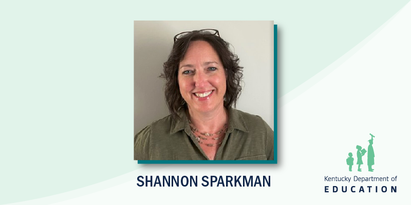 Shannon Sparkman smiles for a headshot
