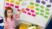 Photo of a student at Barbourville Independent holding up a sign with words 8.21.23