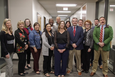 Jennifer Montgomery poses for a photo with members of Kentucky Department of Education leadership