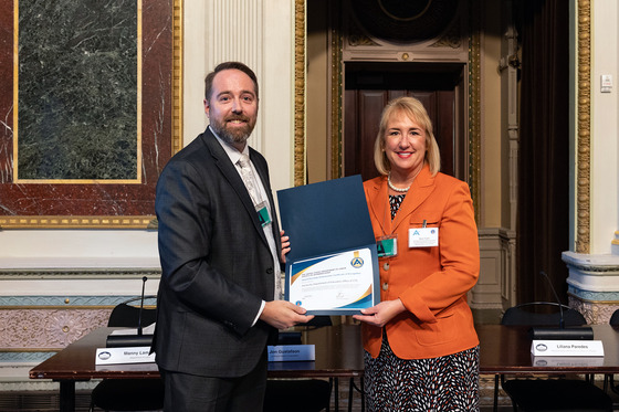 Mary Taylor accepts an Apprenticeship Ambassador award from the U.S. Department of Labor