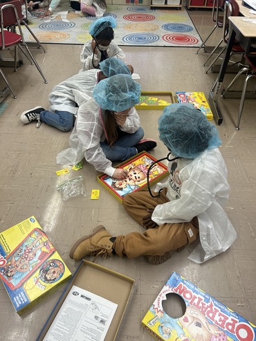Students playing Operation Game