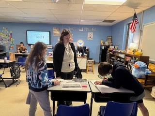 Teacher with students