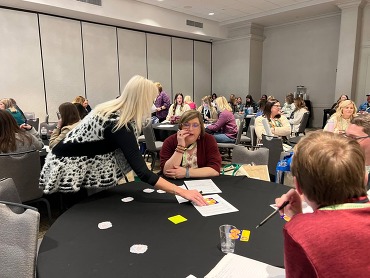 Teachers working together at table