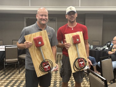 Fire Science Teachers Receiving Pull Station Props at KACTE Conference