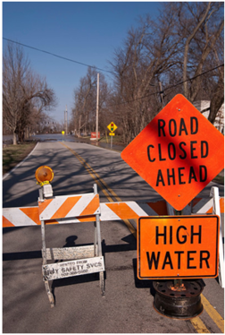 Road Closed high water sign