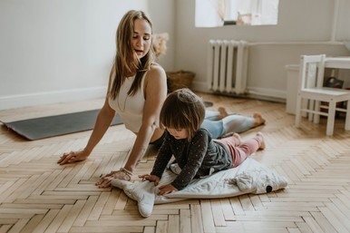 mom and daughter exercising