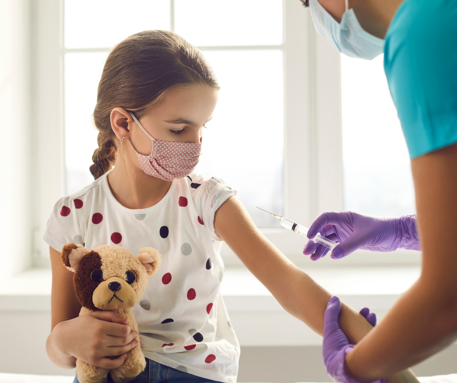 kid getting vaccine