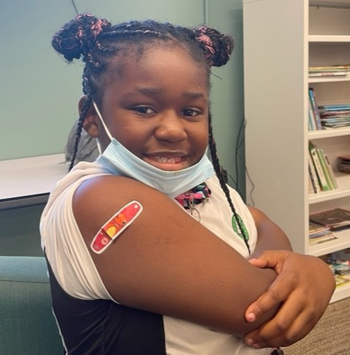 Child receiving vaccine