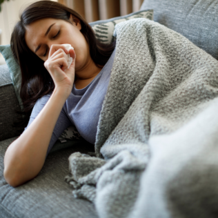 photo of woman coughing