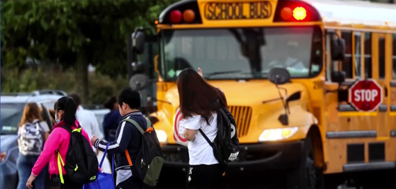 School Kids in Front of Bus