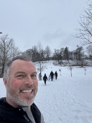 Ben with kids sledding