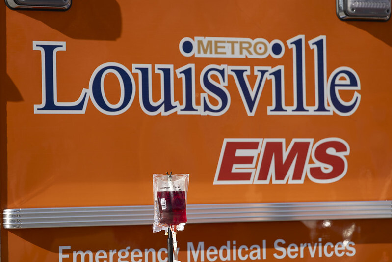 Image of Louisville Metro EMS ambulance and blood bag