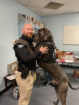 Officer tracy and Odin the therapy dog