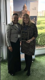 Mary-Elizabeth Bailey and Secretary Gerina Whethers posing at IMPA-KY Awards