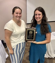 Mallory Frye with Presenter of the Year award for KEEN