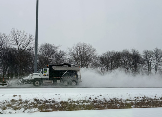 A snow plow clearing roads