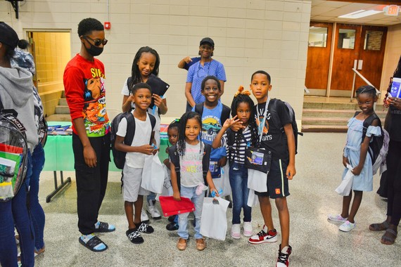 Group shot of kids with backpacks 