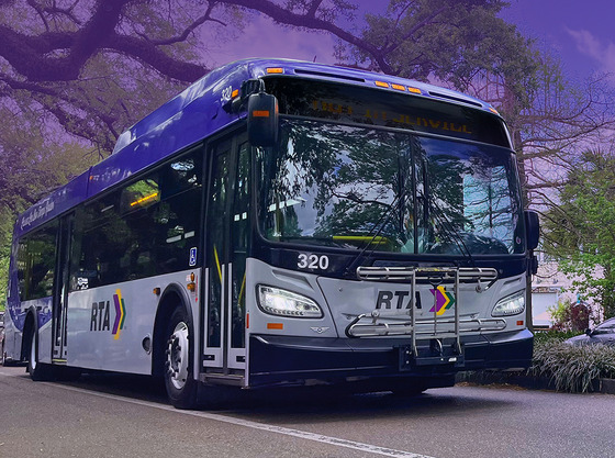 Bus driving down Esplanade Ave.