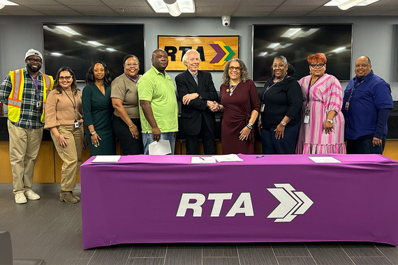 Group photo at labor agreement signing