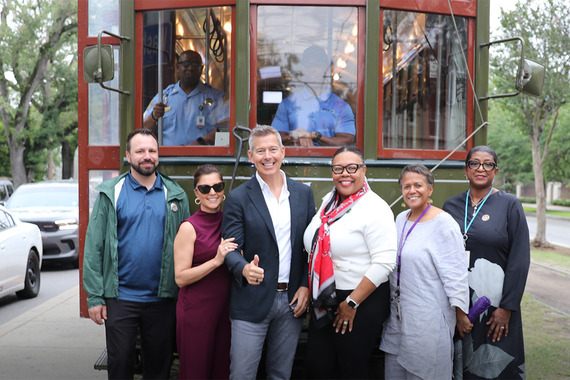 Sec. Duffy with RTA staff in front of St. Charles streetar