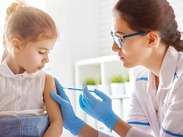 Child Receiving Vaccine From Medical Provider