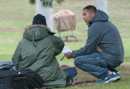 Point in Time Count volunteer speaking to an unhoused person