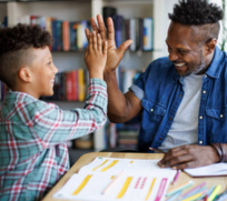Father giving child a high-five